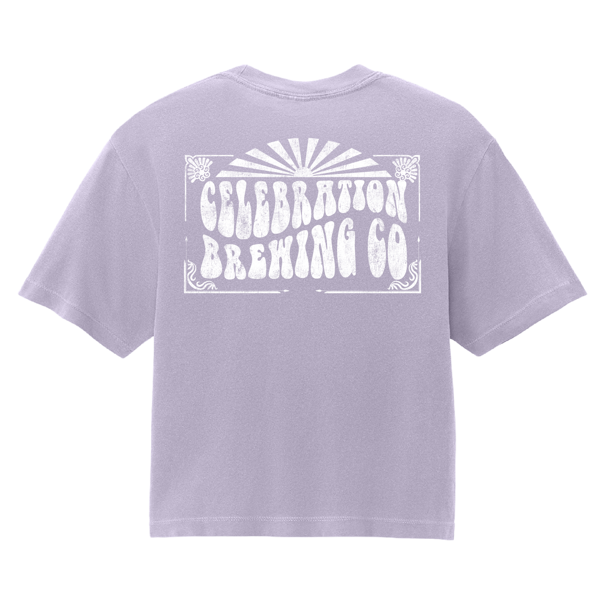 A light lavender purple short-sleeve t-shirt shown from the back, featuring a large white distressed graphic that reads 'CELEBRATION BREWING CO' with a sunburst design above it.
