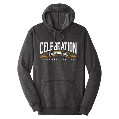 A dark heather gray pullover hoodie with a front graphic that reads 'CELEBRATION BREWING CO.' and 'CELEBRATION, FL' in white and gold, shown on a plain white background.